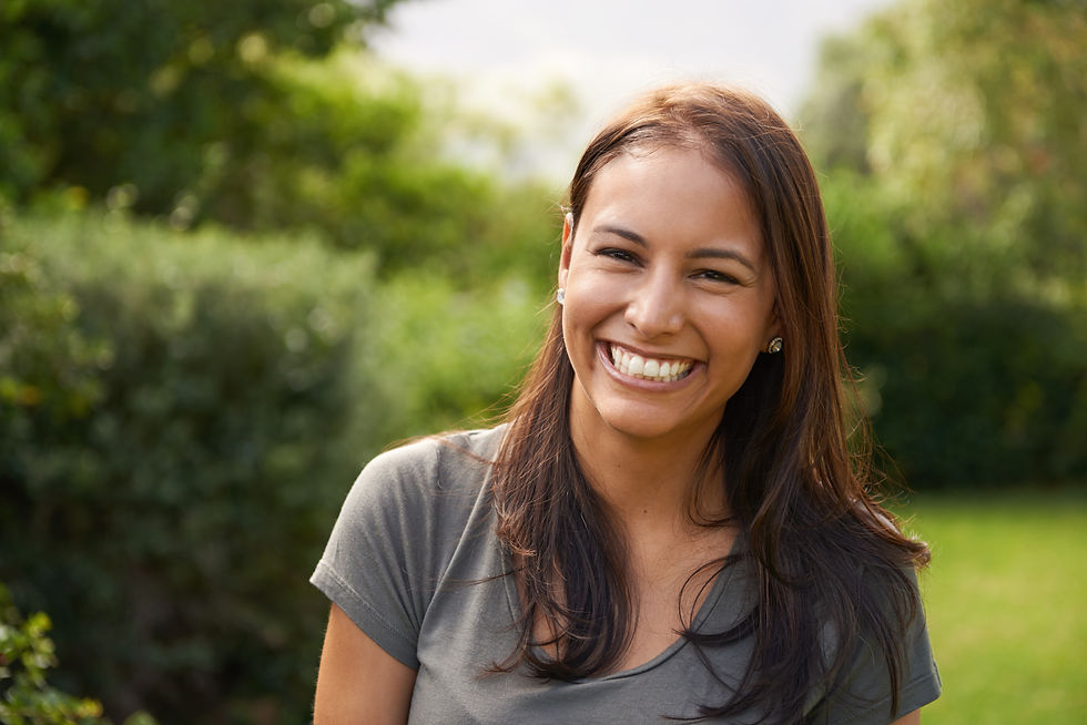 Woman in nature smiling